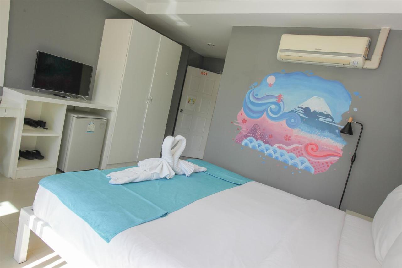 Guan Chao Yin Hotel Patong Bagian luar foto